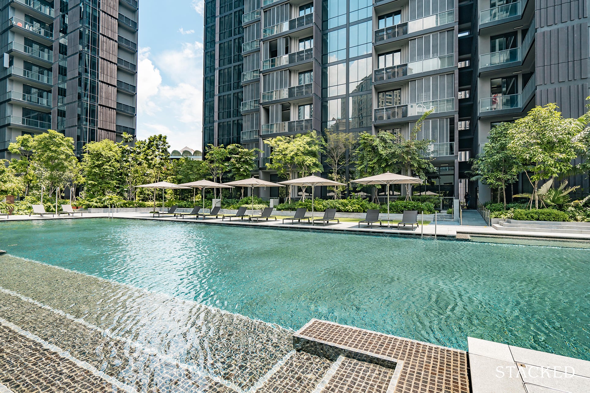 martin modern condo poolside umbrellas