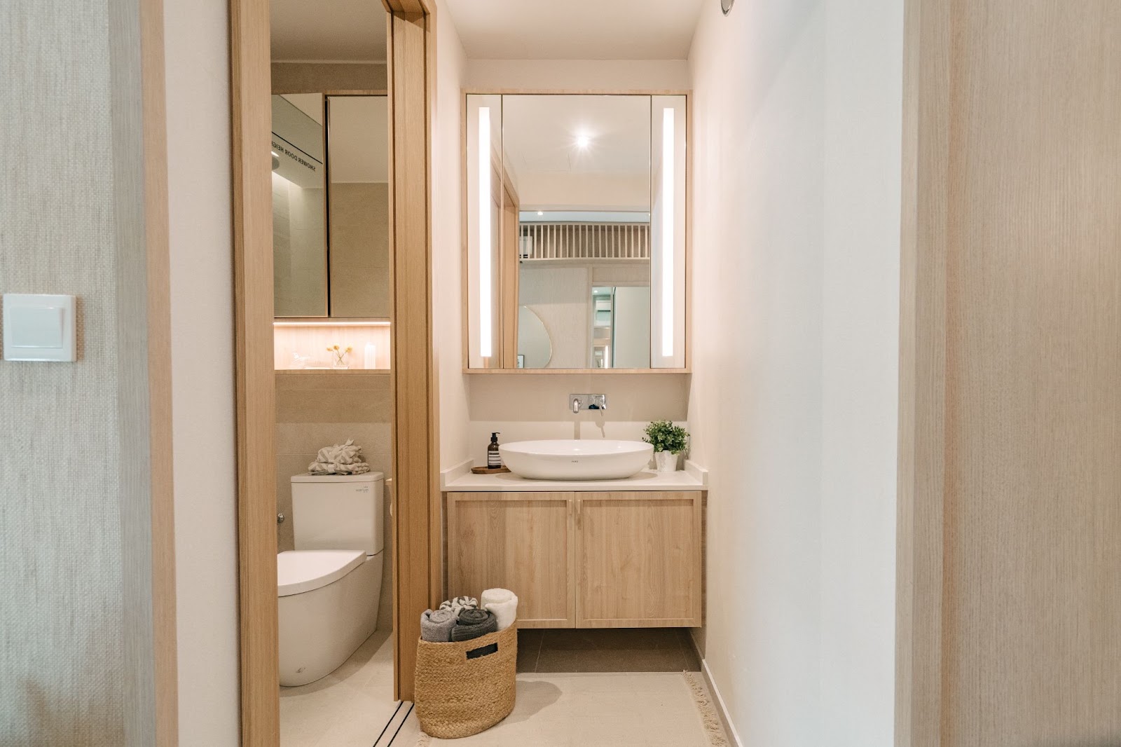 Atlassia 2-bedroom show flat bathroom with the basin placed outside the shower and toilet