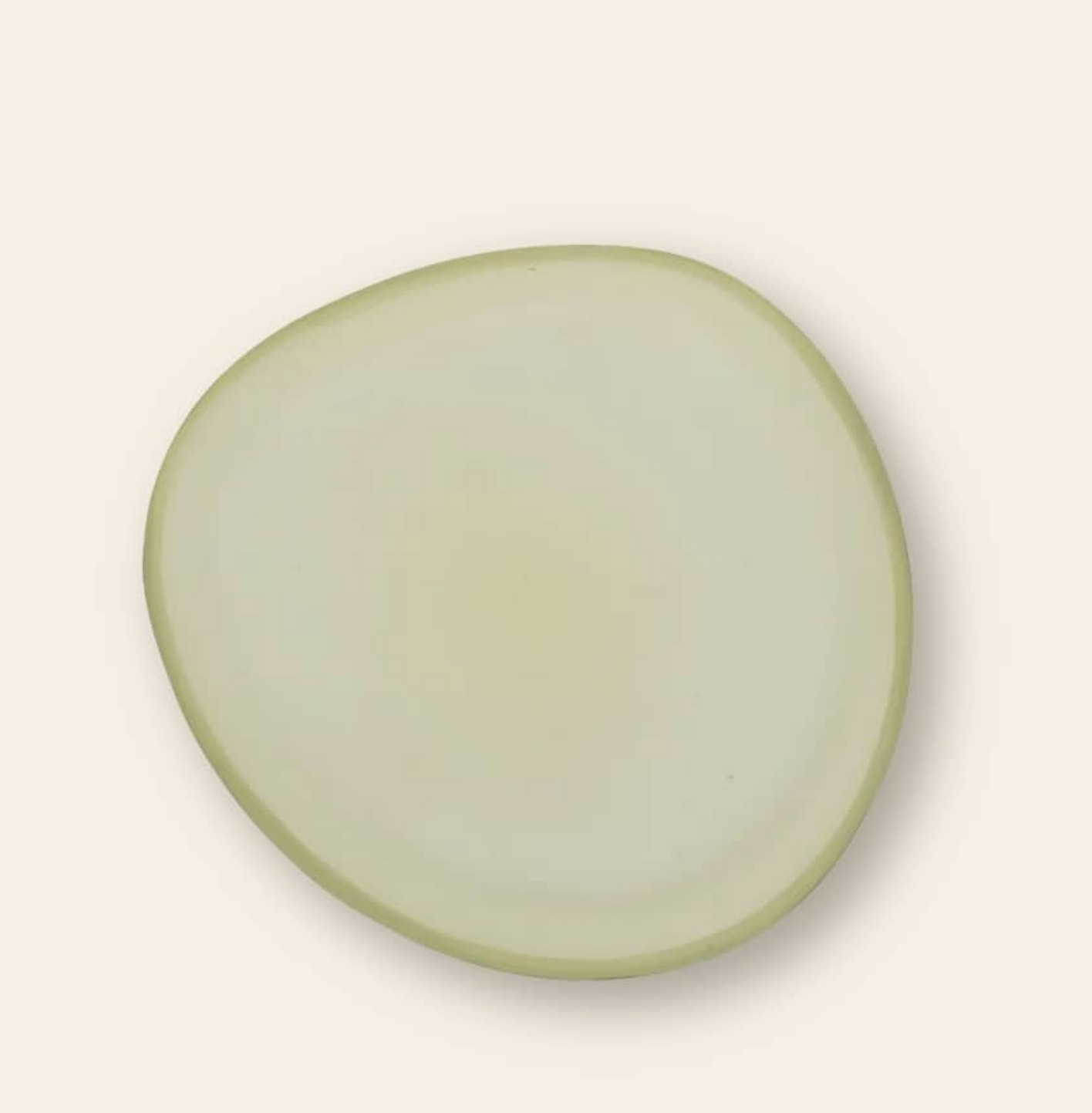 Urban Nature Culture recycled glass plate in a pale green organic shape