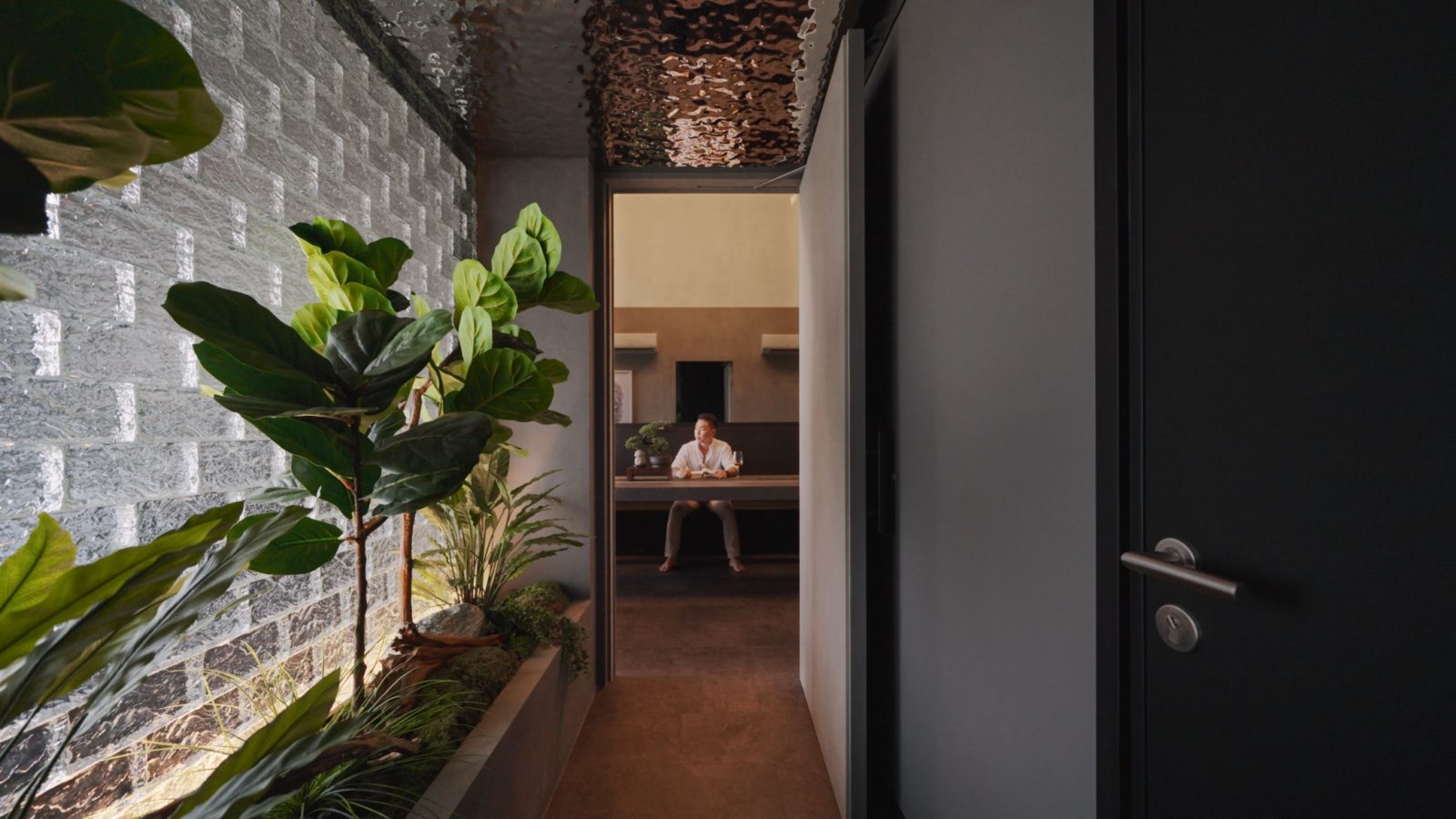 Inside A Oriental Brutalist Home With A Unique Glass Brick Walkway