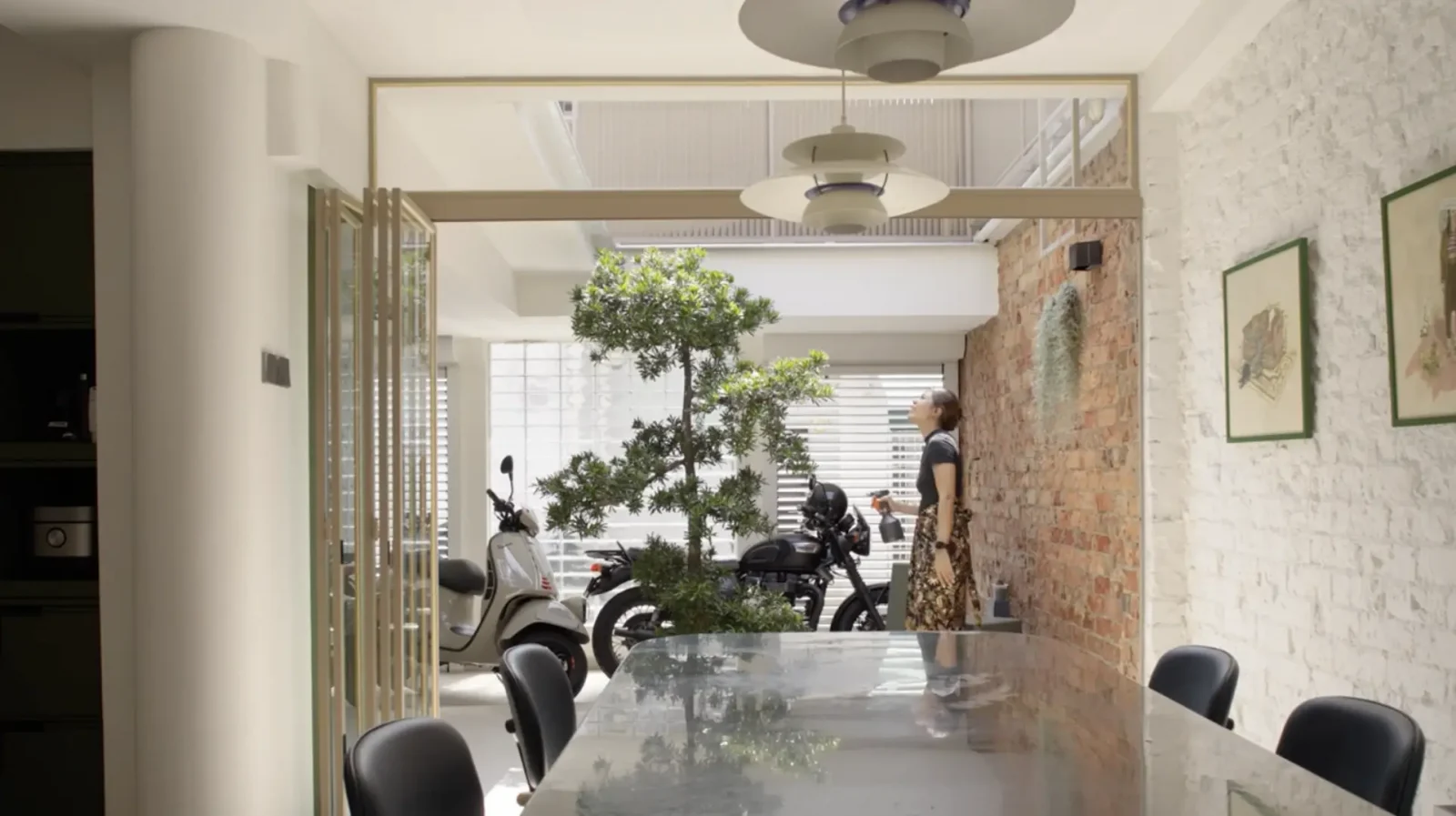 Inside A 1940s Shophouse Unit With A Rustic Motorcycle Garage 13