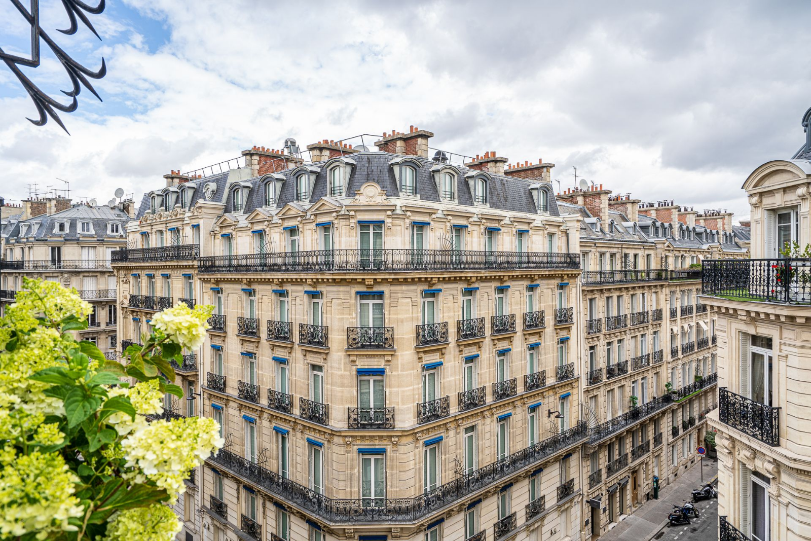 Haussmann-style apartment buildings on a Paris street