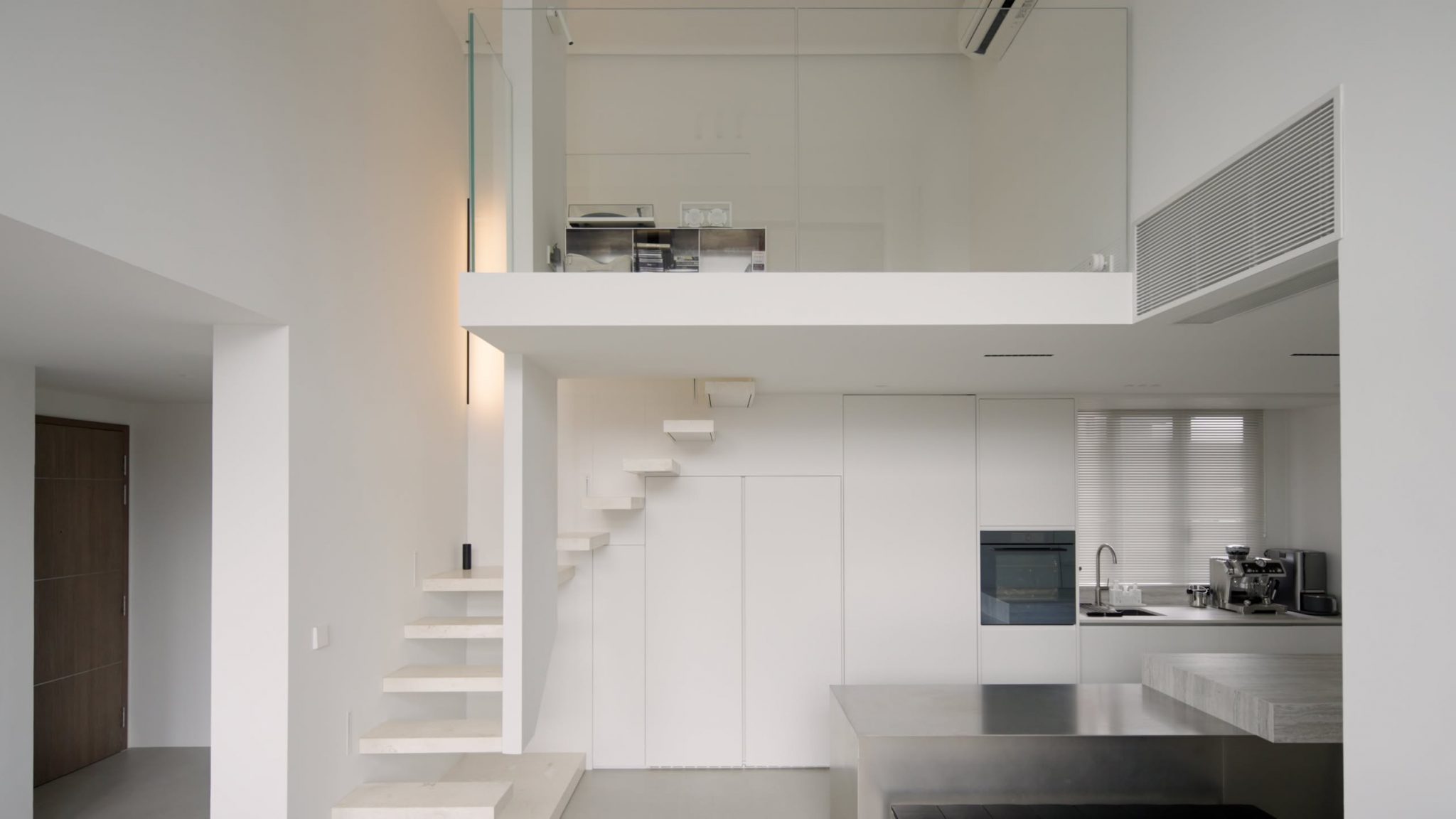 A Bright Minimalist Condo Apartment With A Loft