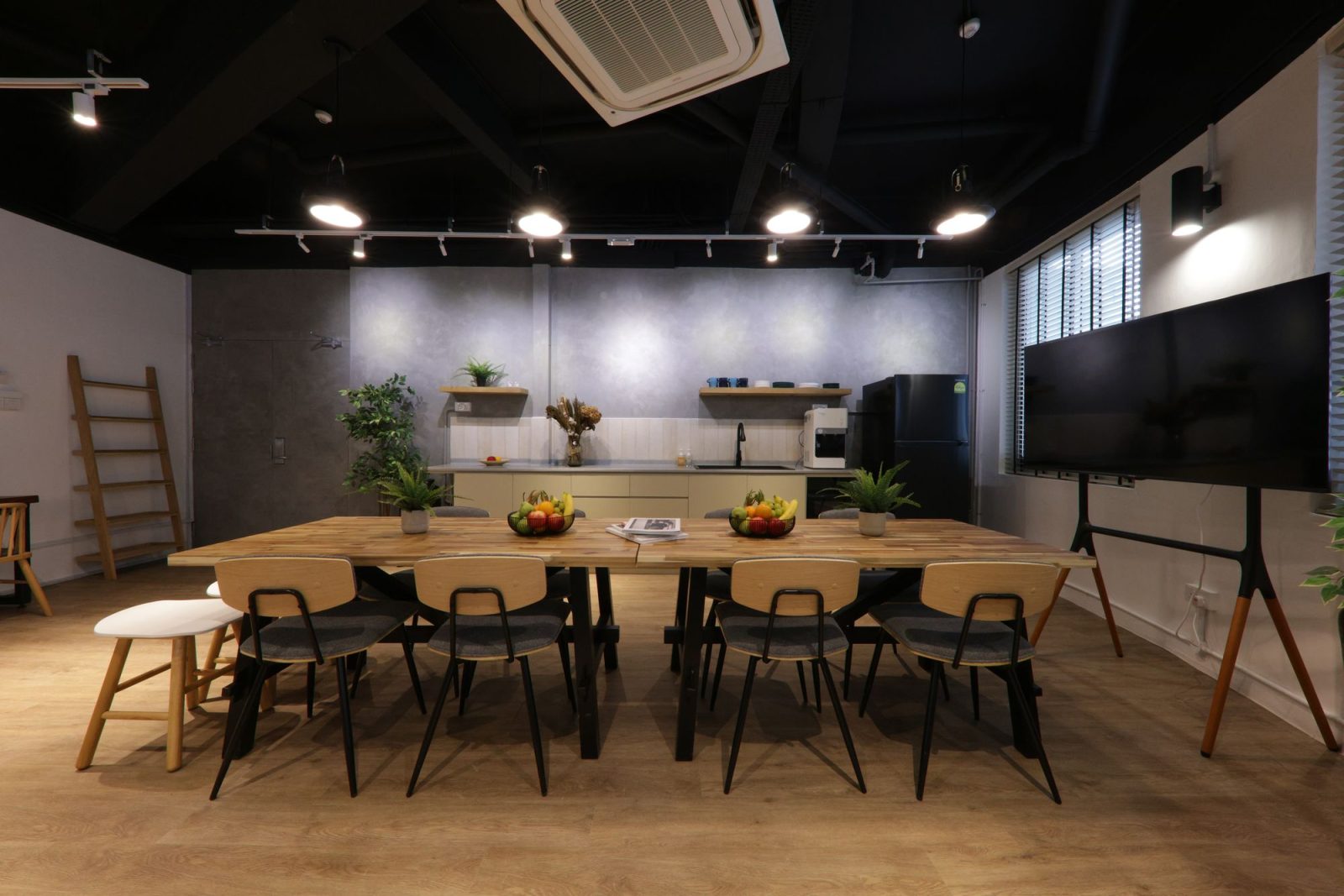 Long dining table for guests to enjoy a meal while socialising with one another