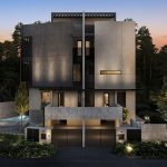 Modern three-storey semi-detached house with concrete facade, gated car porch, trees, and evening sky background
