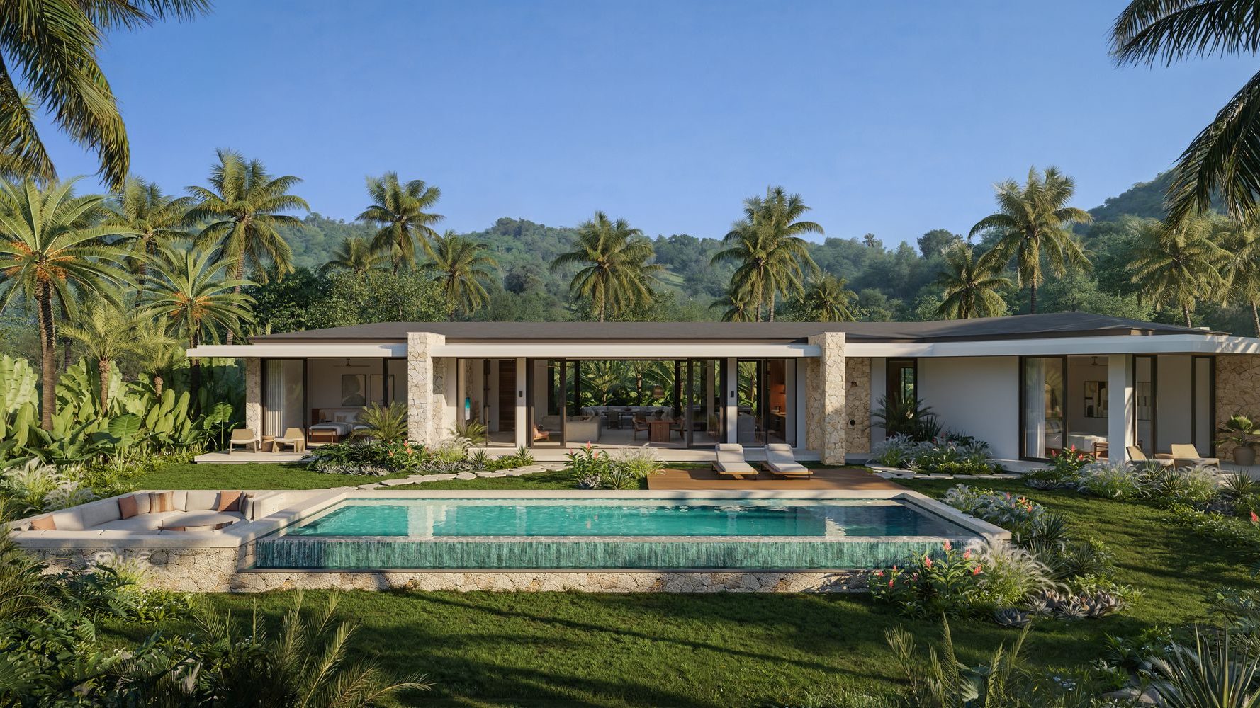 Single-storey house with a pool, sun loungers, sunken seating, surrounded by palm trees and greenery