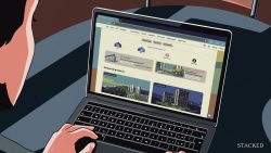 Person using a laptop showing a Singapore property website with property listings and search options