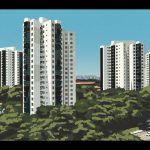 Tall white residential apartment blocks with glass balconies surrounded by dense trees under a clear sky