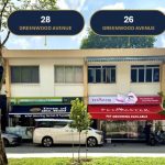 Two-storey commercial shop units at 26 and 28 Greenwood Avenue with pet grooming and retail shops
