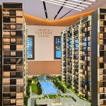 Architectural model of Lucerne Grand condominium with residential towers, pool, and clubhouse facilities