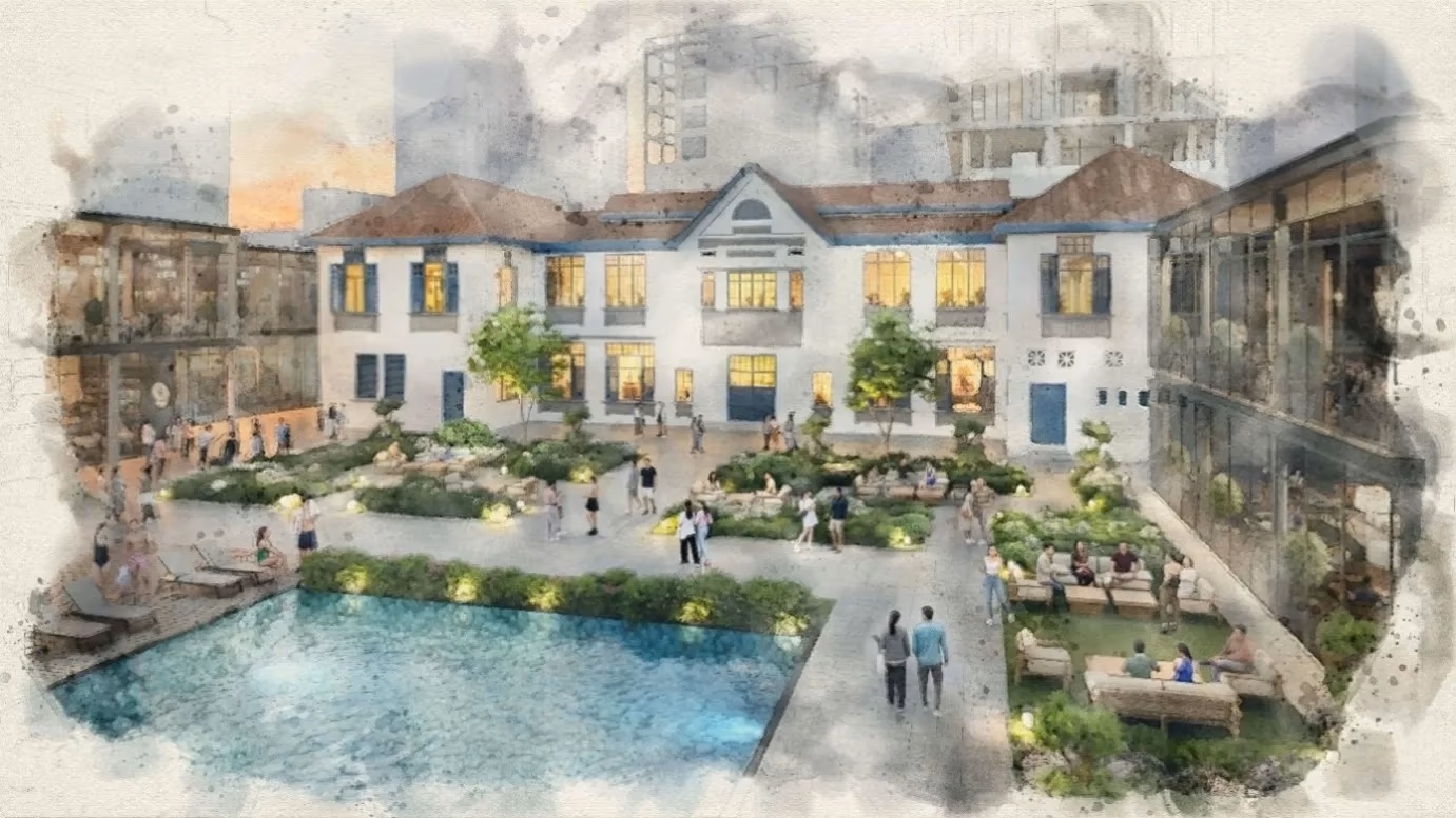 Courtyard with pool and garden seating surrounded by two-storey colonial-style and modern buildings at dusk