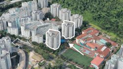 High-rise residential blocks near school campus with sports courts and greenery around