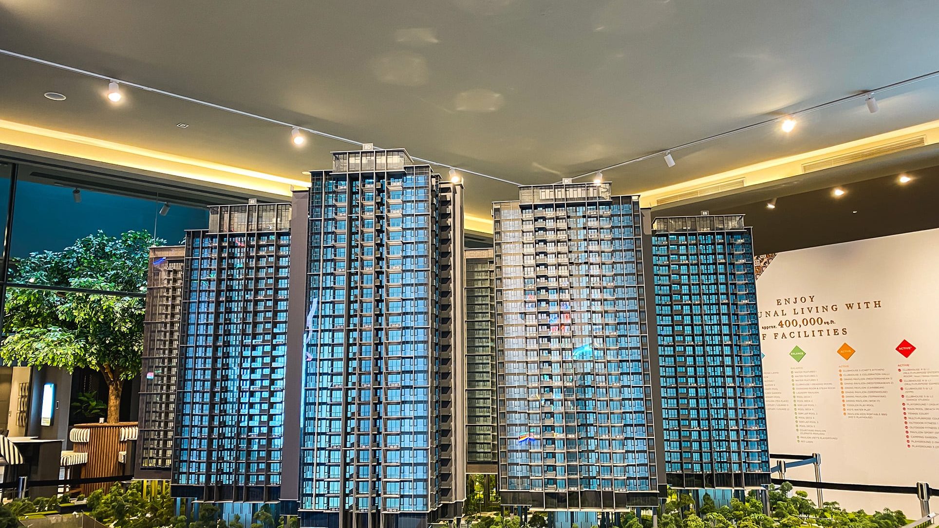 Architectural model of Parc Clematis residential blocks with detailed balconies and windows in a showroom setting