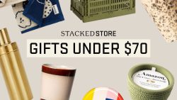 Collage of home items including a green candle, ceramic cup, blue cloth, gold bottle and plastic crate with text Gifts Under $70