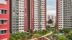 Multi-storey Ang Mo Kio Court blocks with playgrounds and landscaped gardens in between