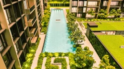 Scale model of Altura EC showing a lap pool, maze garden, residential blocks and green roof buildings