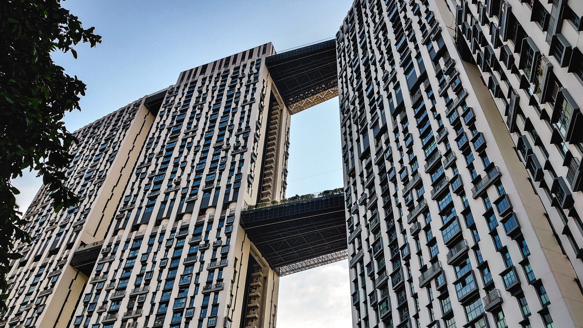 Pinnacle@Duxton residential blocks with sky bridges linking the towers under a clear sky