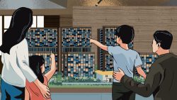 Family of four looking out a large window at modern high-rise residential blocks with greenery below