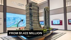 Scale model of Union Square Residences with digital screen showing location and price tag from $1.422 million