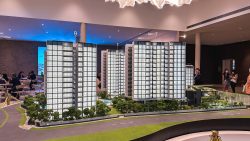 The Botany At Dairy Farm residential blocks scale model with landscaping inside a sales gallery
