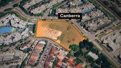 Aerial view of Canberra plot outlined in orange surrounded by residential blocks and roads