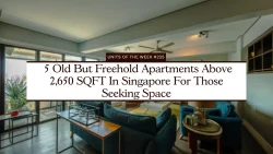 Living room with blue sofas, ceiling fan, glass windows and potted plants, caption about freehold apartments