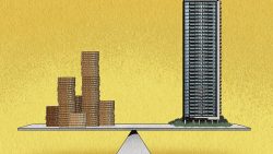 Stacked coins balanced against a high-rise apartment block on a seesaw platform against a yellow background
