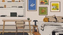 Bedroom with wooden desk and chair, bed with pillows, bedside stool and framed artwork on wall