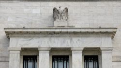Marble facade of the Federal Reserve building with an eagle sculpture above the entrance