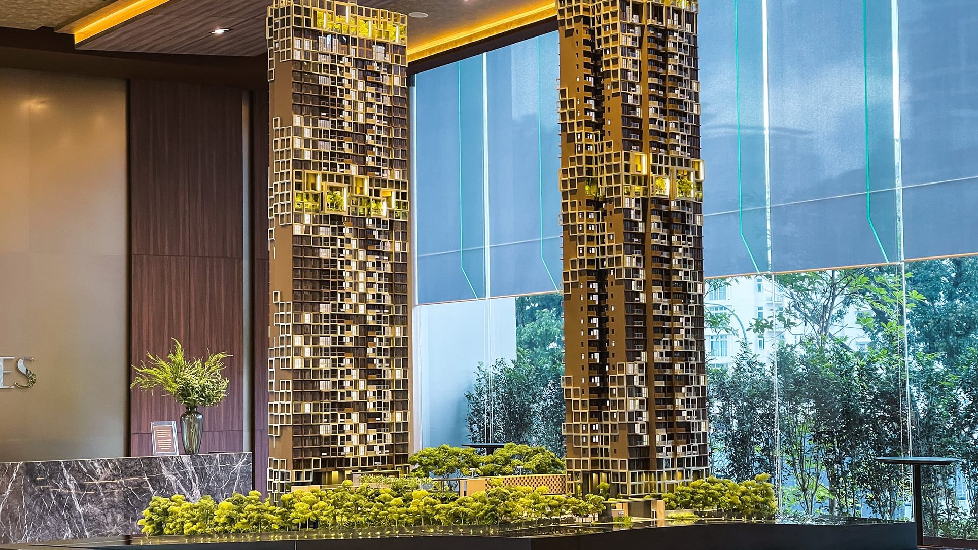 Detailed architectural model of Irwell Hill Residences with two high-rise towers and surrounding greenery
