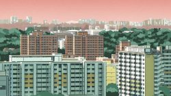 Public housing blocks with green trees and distant apartment blocks under a pink sky at sunset