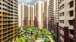 West Plains @ Bukit Batok residential blocks surrounding landscaped playground with slides and swing sets