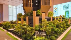 Architectural model of The Serra Residences showing residential blocks with lush greenery and trees