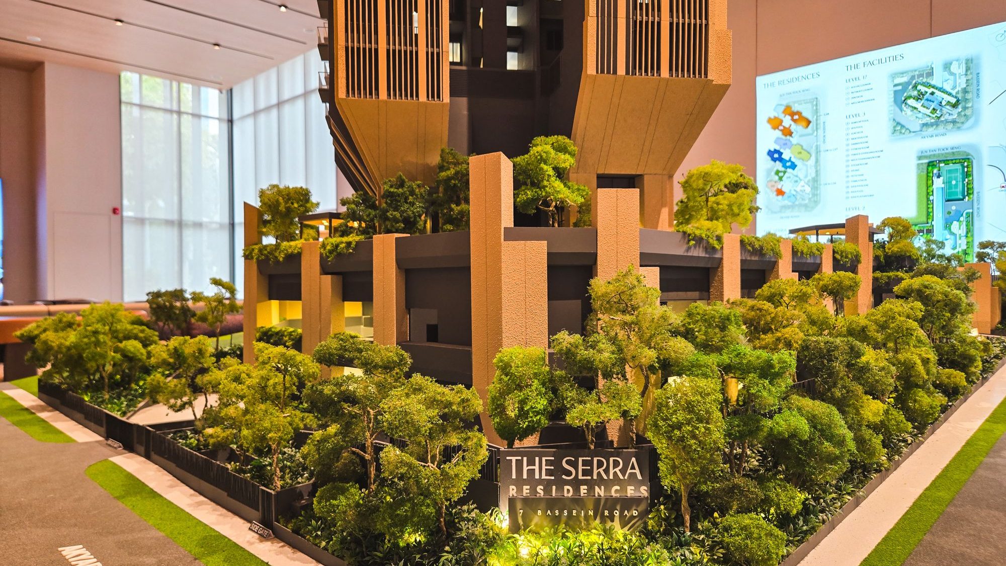 Architectural model of The Serra Residences showing residential blocks with lush greenery and trees