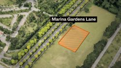 Aerial view of a green area with roads and a highlighted land plot labelled Marina Gardens Lane